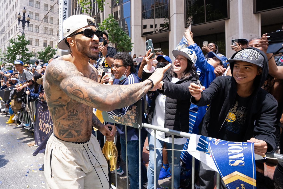 Gary Payton II celebrating with the crowd at the Warriors parade 