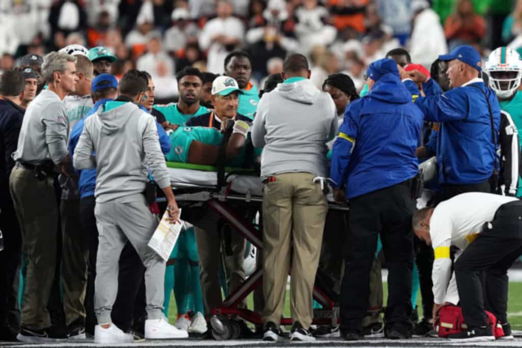 Tua Tagovailoa injury update: Dolphins QB leaves game with head,  buffalo bills t shirt women's neck injuries