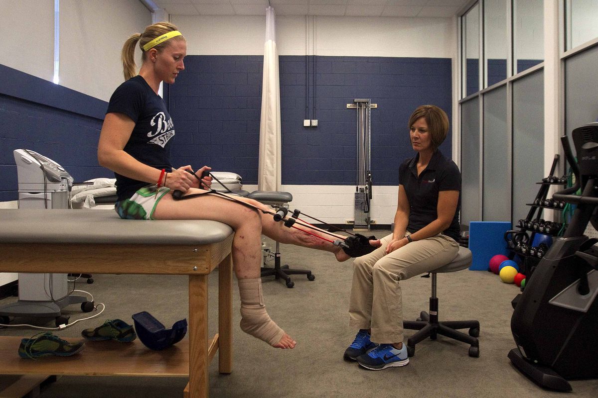 Triathlete Nicole Gross progresses with physical therapy months after the April 15 bombing.